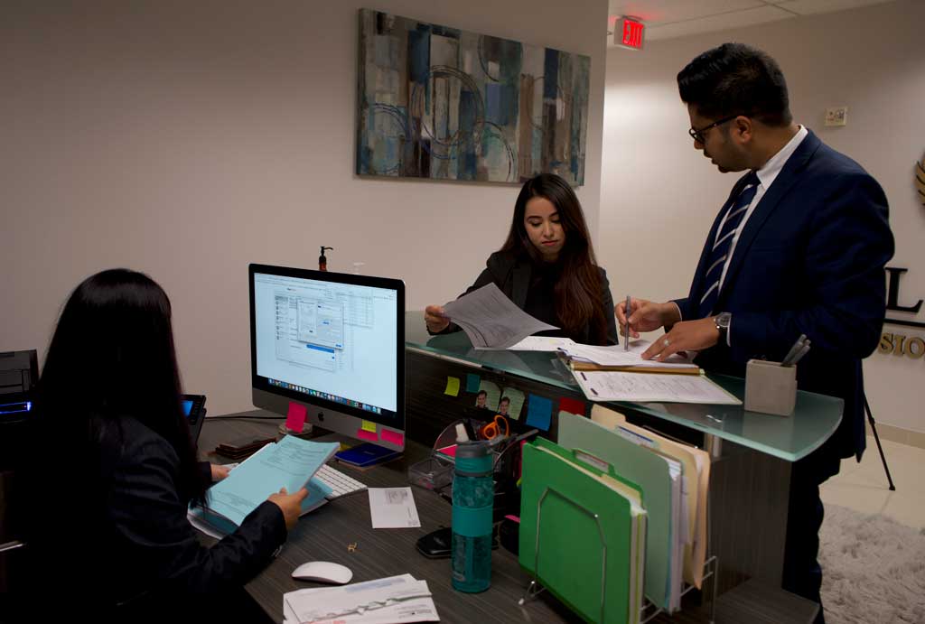 Saurab Working In Front With Staff